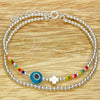 Sterling Silver Adjustable Bolo Bracelet, Ball and Evil Eye Design, with Blue Topaz and Orange Red Crystal, Polished, Silver Finish, 03.402.0024.07 (02 MM Thickness, 7 Inches Length)