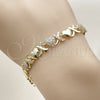 Oro Laminado Fancy Bracelet, Gold Filled Style Hugs and Kisses and Heart Design, with White Micro Pave, Polished, Golden Finish, 03.283.0259.07 (08 MM Thickness, 7 Inches Length)