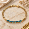 Oro Laminado Fancy Bracelet, Gold Filled Style Bismark Design, with Turquoise Cubic Zirconia, Polished, Golden Finish, 03.213.0173.08 (04 MM Thickness, 8 Inches Length)