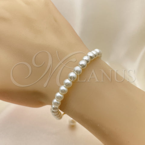 Oro Laminado Fancy Bracelet, Gold Filled Style Ball Design, with Ivory Pearl, Polished, Golden Finish, 03.405.0006.07 (07 MM Thickness, 7 Inches Length)