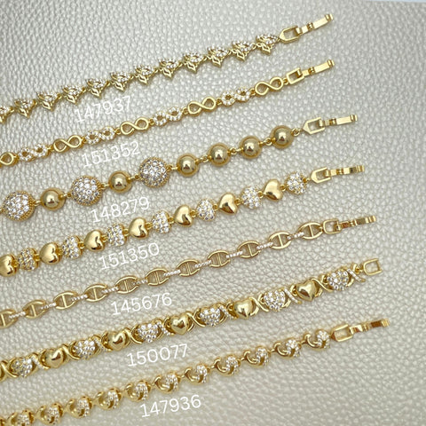 15 elegantes brazaletes de moda con zirconio ($6.67 cada uno) por $100 en capas de oro 