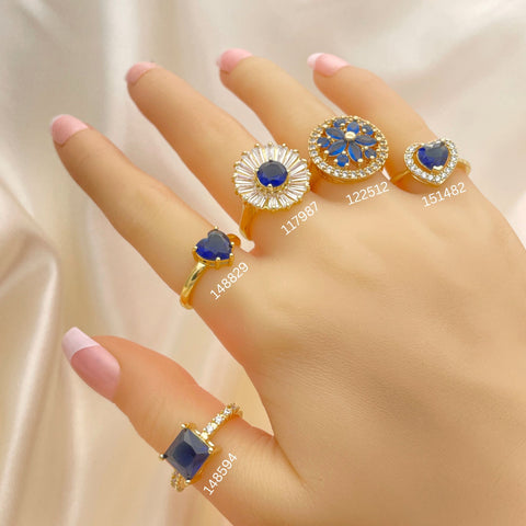 20 anillos surtidos de zirconia azul en oro laminado por $100 ($5.00 c/u) en oro laminado