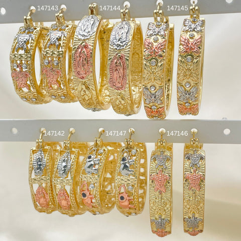 25 argollas tricolores de diseño variado en oro laminado con relleno de oro ($4.00 cada una) por $100 en capas de oro 