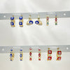 30 Assorted Evil Eye Huggie Hoops in Oro Laminado Gold Filled ($3.33 each) for $100 Gold Layered