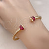 Oro Laminado Individual Bangle, Gold Filled Style Twist Design, with Ruby Cubic Zirconia, Polished, Golden Finish, 07.342.0001 (04 MM Thickness, One size fits all)