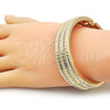 Oro Laminado Individual Bangle, Gold Filled Style Twist Design, Diamond Cutting Finish, Golden Finish, 07.307.0028.04 (18 MM Thickness, Size 4 (2.25 Diameter))