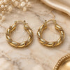 Oro Laminado Medium Hoop, Gold Filled Style Hollow and Twist Design, Polished, Golden Finish, 02.170.0498.30