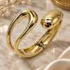 Oro Laminado Individual Bangle, Gold Filled Style Teardrop Design, Polished, Golden Finish, 07.422.0009.05 (45 MM Thickness, Size 5 (2.50 Diameter))