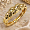 Oro Laminado Individual Bangle, Gold Filled Style Twist Design, Polished, Golden Finish, 07.307.0033.04 (20 MM Thickness, Size 4 (2.25 Diameter))