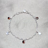Sterling Silver Charm Bracelet, Star Design, with Garnet Cubic Zirconia, Polished, Silver Finish, 03.409.0171.07 (03 MM Thickness, 7 Inches Length)