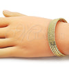 Oro Laminado Individual Bangle, Gold Filled Style Twist Design, Diamond Cutting Finish, Golden Finish, 07.170.0041.1 (14 MM Thickness, One size fits all)