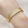 Oro Laminado Individual Bangle, Gold Filled Style Twist Design, Diamond Cutting Finish, Golden Finish, 07.170.0041.1 (14 MM Thickness, One size fits all)
