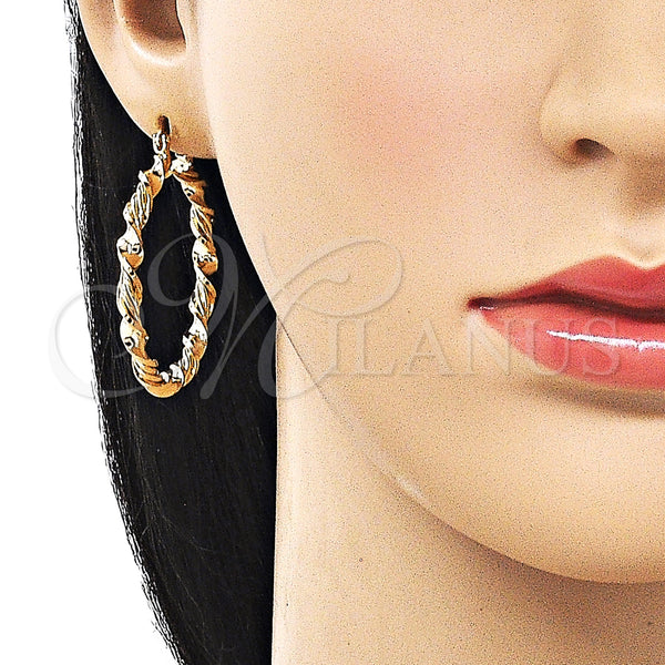 Gold Filled Hoop Earrings — Medium Hoop Twist Design Polished 02. — alternate product view — SKU 161853 | Oro Laminado aretes de aro — Medium Hoop Twist diseño pulido 02. — SKU 161853