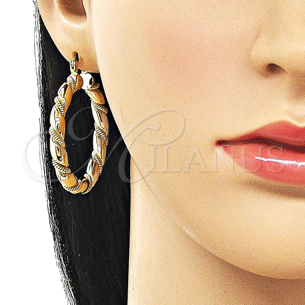 Gold Filled Hoop Earrings — Medium Hoop Hollow and Twist Design Polished 02. — alternate product view — SKU 162140 | Oro Laminado aretes de aro — Medium Hoop Hollow and Twist diseño pulido 02. — SKU 162140