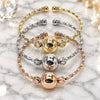 Oro Laminado Trio Bangle, Gold Filled Style Ball and Twist Design, Polished, Tricolor, 07.282.0050 (16 MM Thickness, One size fits all)