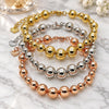 Oro Laminado Fancy Bracelet, Gold Filled Style Ball and Hollow Design, Polished, Tricolor, 03.282.0012.08 (10 MM Thickness, 8 Inches Length)