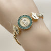 Oro Laminado Fancy Bracelet, Gold Filled Style Guadalupe and Praying Hands Design, with Green Cubic Zirconia, Polished, Golden Finish, 03.196.0021.07 (Thickness, 8 Inches Length)