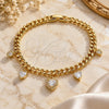 Oro Laminado Charm Bracelet, Gold Filled Style Heart and Miami Cuban Design, with White Cubic Zirconia and White Micro Pave, Polished, Golden Finish, 03.283.0552.07 (05 MM Thickness, 7 Inches Length)