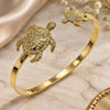 Oro Laminado Individual Bangle, Gold Filled Style Turtle Design, Polished, Golden Finish, 07.413.0006 (04 MM Thickness, One size fits all)