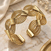 Oro Laminado Individual Bangle, Gold Filled Style Twist Design, Diamond Cutting Finish, Golden Finish, 07.331.0003 (23 MM Thickness, One size fits all)