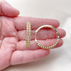 Oro Laminado Huggie Hoop, Gold Filled Style with White Cubic Zirconia, Polished, Golden Finish, 02.237.0059.1.30