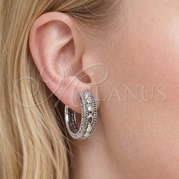 White Gold Filled Hoop Earrings — Huggie Hoop Polished 02. — alternate product view — SKU 164548 | Oro Laminado Blanco aretes de aro — Huggie Hoop pulido 02. — SKU 164548