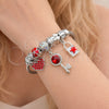Stainless Steel Individual Bangle, key and Lock Design, with Aurore Boreale and Crystal Crystal, Red Enamel Finish, Steel Finish, 07.463.0003.1 (03 MM Thickness, One size fits all)
