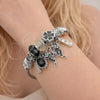 Stainless Steel Individual Bangle, Butterfly and Flower Design, with Jet and Aurore Boreale Crystal, Black Enamel Finish, Steel Finish, 07.463.0006.1 (03 MM Thickness, One size fits all)
