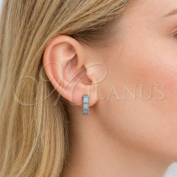 White Gold Filled Hoop Earrings — Huggie Hoop with Light Turquoise Cubic Zirconia Polished — alternate product view — SKU 165069 | Oro Laminado Blanco aretes de aro — Huggie Hoop with Light Turquoise Cubic Zirconia pulido — SKU 165069