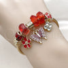 Stainless Steel Individual Bangle, Butterfly and Flower Design, with Light Siam and Crystal Crystal, Red Enamel Finish, Golden Finish, 07.464.0036 (03 MM Thickness, One size fits all)