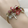 Stainless Steel Individual Bangle, Flower and key Design, with Light Siam and Crystal Crystal, Red Enamel Finish, Golden Finish, 07.464.0046 (03 MM Thickness, One size fits all)