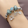 Stainless Steel Individual Bangle, Swan and Heart Design, with Light Turquoise and Aurore Boreale Crystal, Turquoise Enamel Finish, Rhodium Finish, 07.454.0015.1 (03 MM Thickness, One size fits all)