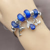 Stainless Steel Individual Bangle, Dolphin and Swan Design, with Capri Blue and Crystal Crystal, Polished, Rhodium Finish, 07.454.0018.1 (03 MM Thickness, One size fits all)
