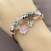 Stainless Steel Individual Bangle, Four-leaf Clover and Heart Design, with Light Rose and Crystal Crystal, Pink Enamel Finish, Rhodium Finish, 07.454.0033 (03 MM Thickness, One size fits all)
