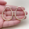 Oro Laminado Medium Hoop, Gold Filled Style Teardrop and Hollow Design, Diamond Cutting Finish, Golden Finish, 02.170.0625.35