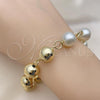 Oro Laminado Fancy Bracelet, Gold Filled Style Ball and Hollow Design, with Ivory Pearl, Polished, Golden Finish, 03.331.0271.09
