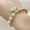 Oro Laminado Fancy Bracelet, Gold Filled Style Shell and Expandable Bead Design, with Ivory Pearl and Ruby Cubic Zirconia, Polished, Golden Finish, 03.341.0252.07