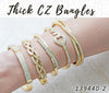12 Thick Zirconia Bangles in Gold Layered ($8.33) ea