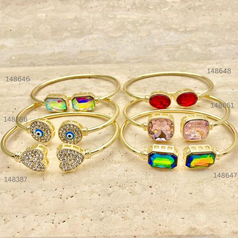 15 piezas de brazaletes de piedras coloridas en capas de oro ($6.67) c/u