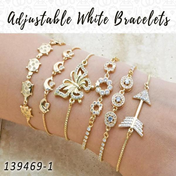 18 brazaletes blancos ajustables en capas de oro ($5.55) c/u
