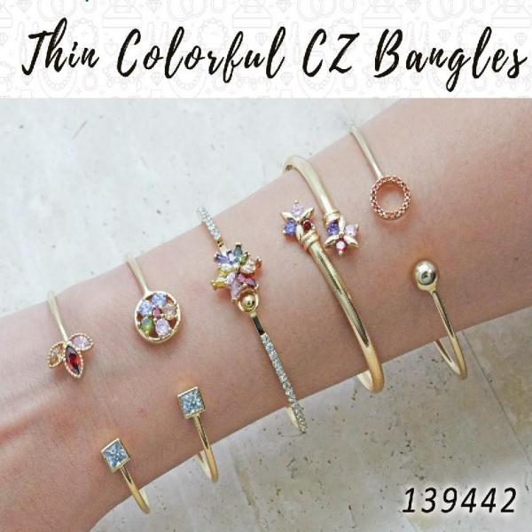 15 brazaletes finos de zirconio de colores en capas de oro ($6.67) c/u