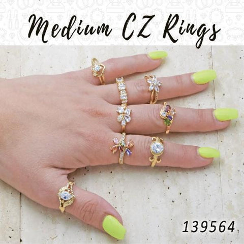 18 anillos medianos de zirconio en capas de oro ($5.55) c/u