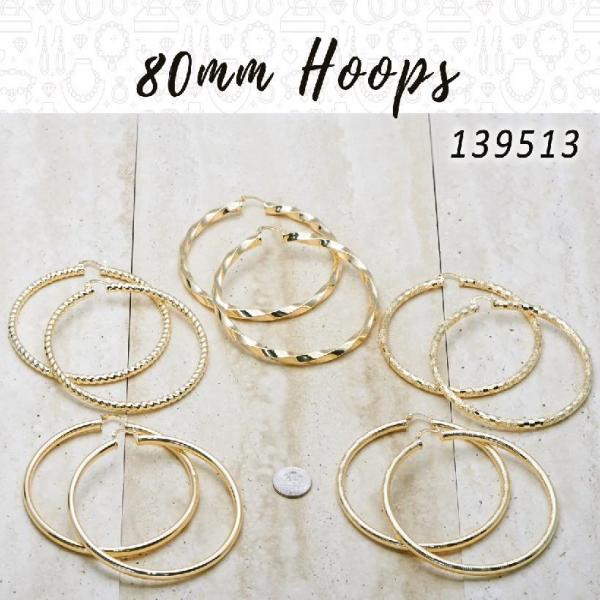 Gold Filled Ring — 18prs of 80mm Diameter Hoop Earrings in $5.55 — main product view — SKU 139513 | Oro Laminado anillo — 18prs of 80mm Diameter Hoop Earrings in $5.55 — SKU 139513