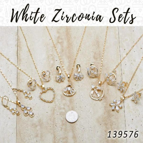 15 juegos de aretes, colgantes y collares de zirconia blanca en capas de oro ($6.67) c/u
