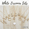 15 juegos de aretes, colgantes y collares de zirconia blanca en capas de oro ($6.67) c/u